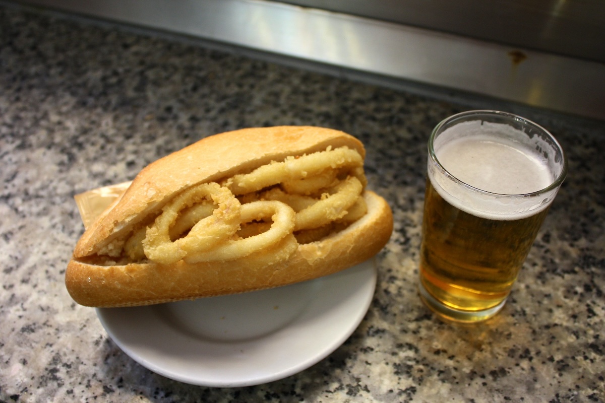 beer and fried calamari sandwich