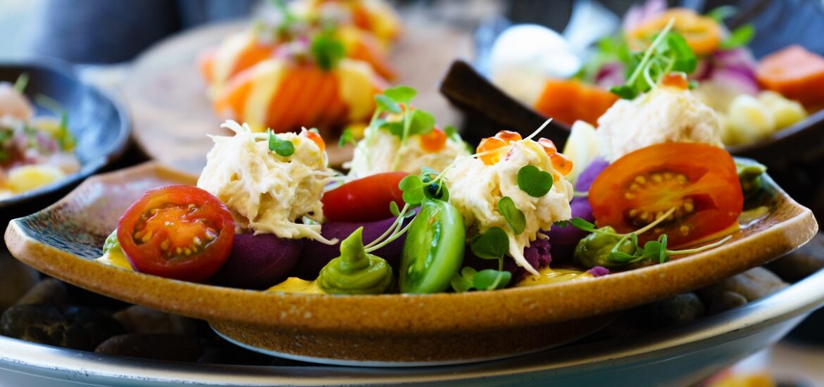 Fancy dish plated beautifuly with veggies at at an outdoor restaurant in San Francisco