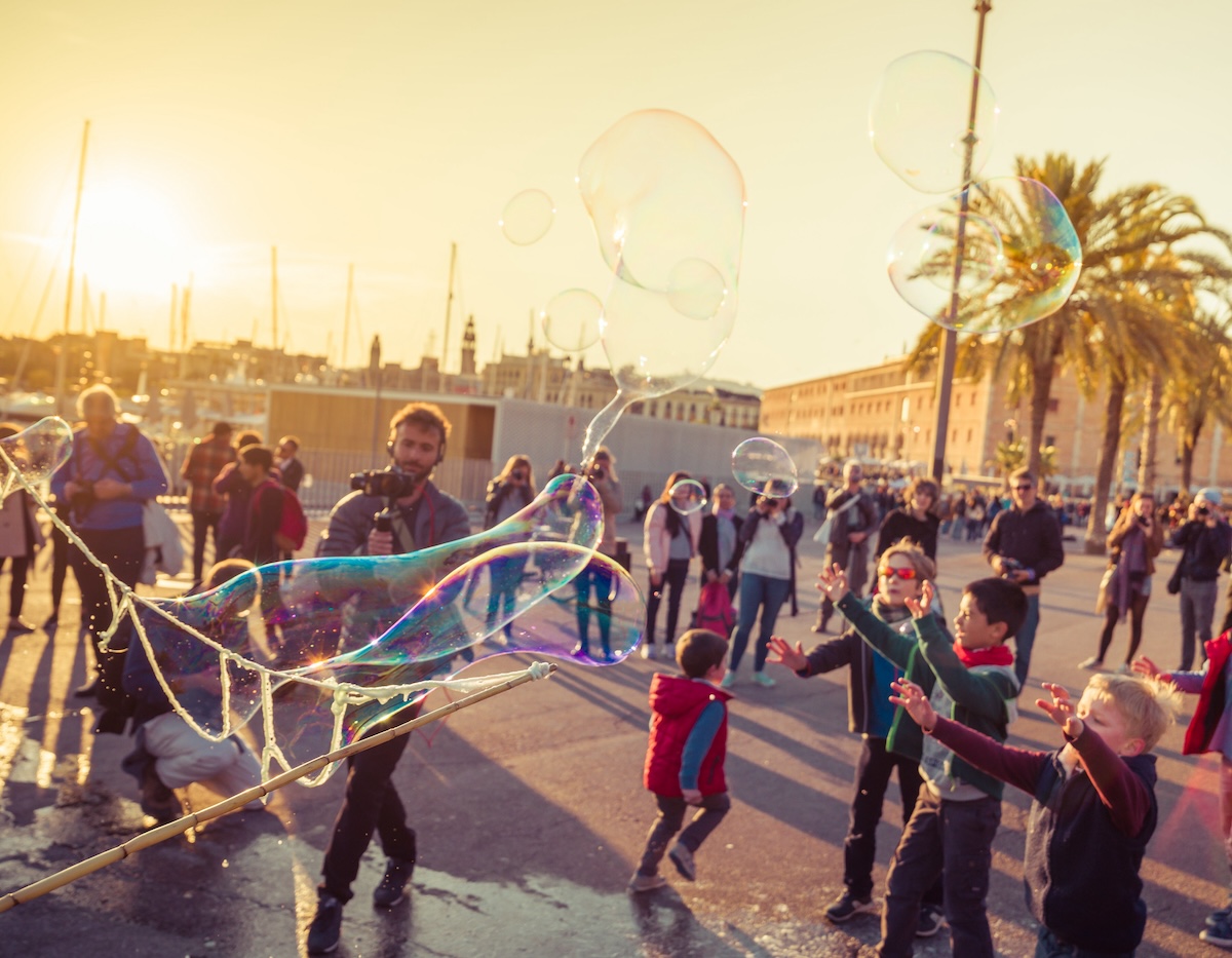 kids playing with bubbles