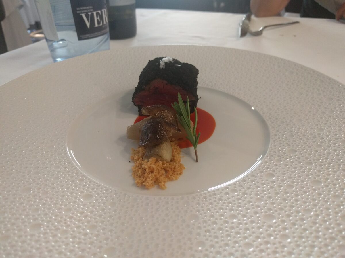 steak on a plate at michelin restaurant