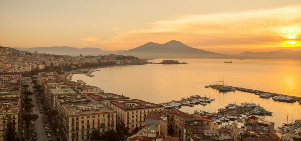 sunset over water in naples