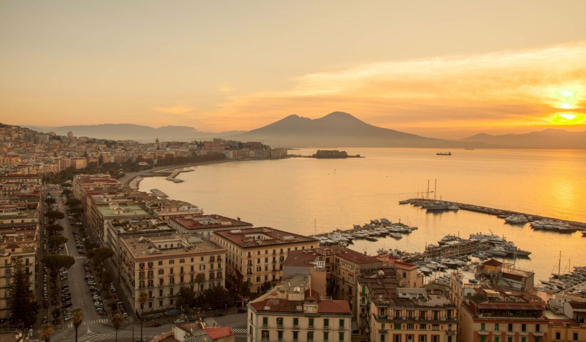 sunset over water in naples