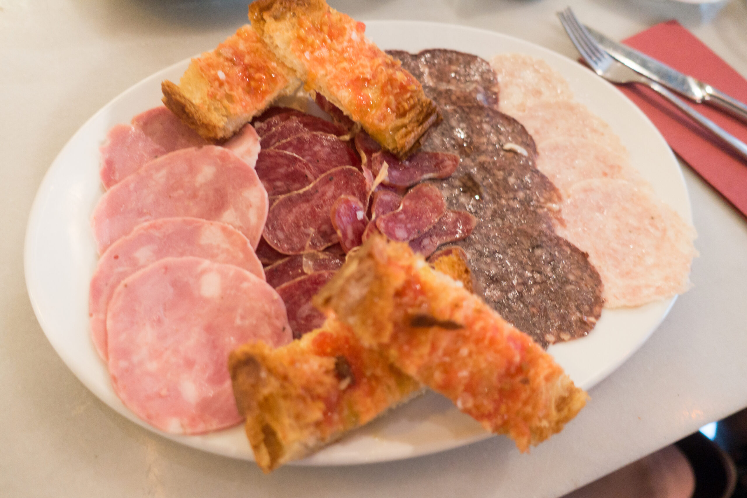 Cured meats and tomato toast