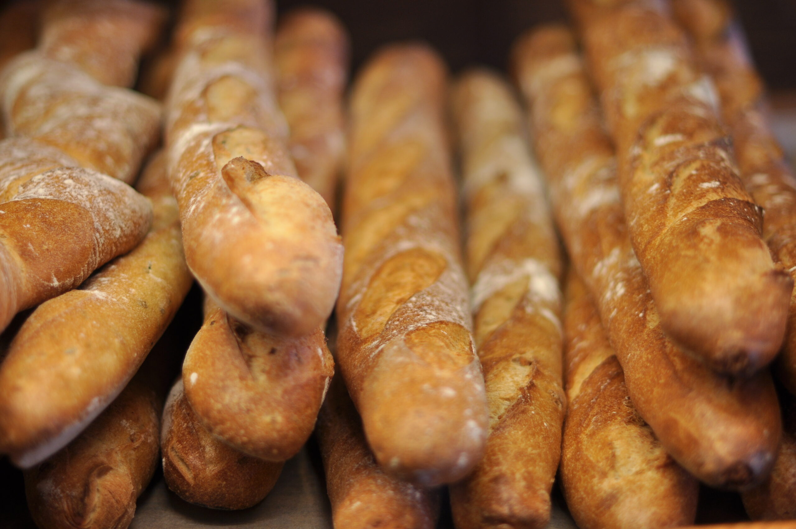 A row of freshly baked baguettes in Paris. 