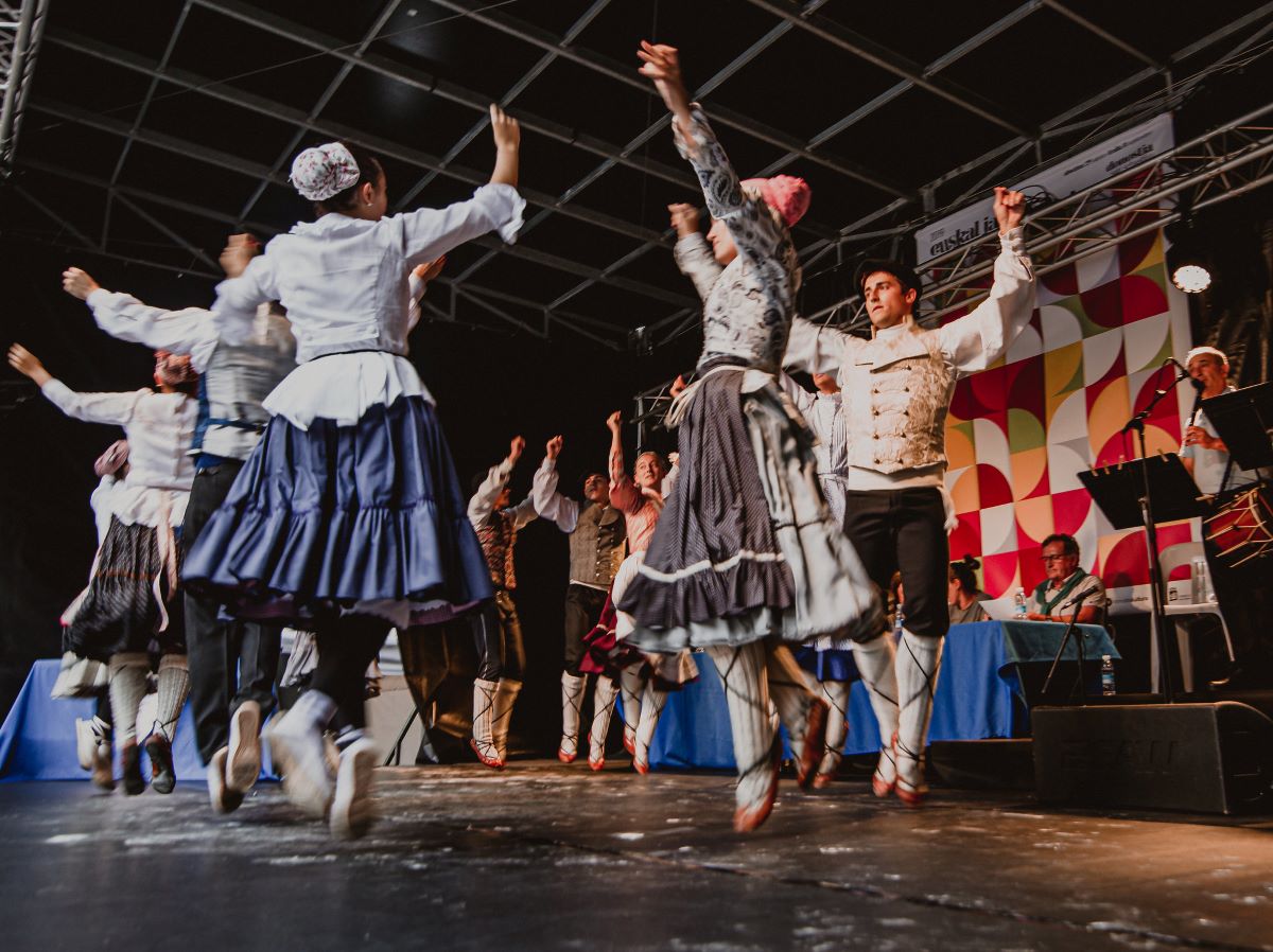 People dancing to traditional Basque music.