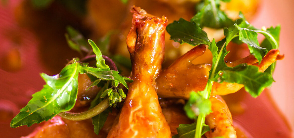 Close up of a roasted chicken with ricotta, pine nuts, and marsala