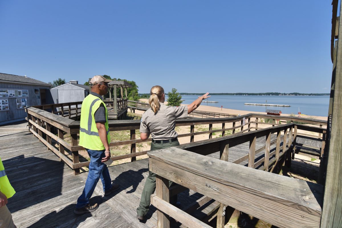 A parks and rec officer giving a tour of Hart Island, the Isle of the Dead.