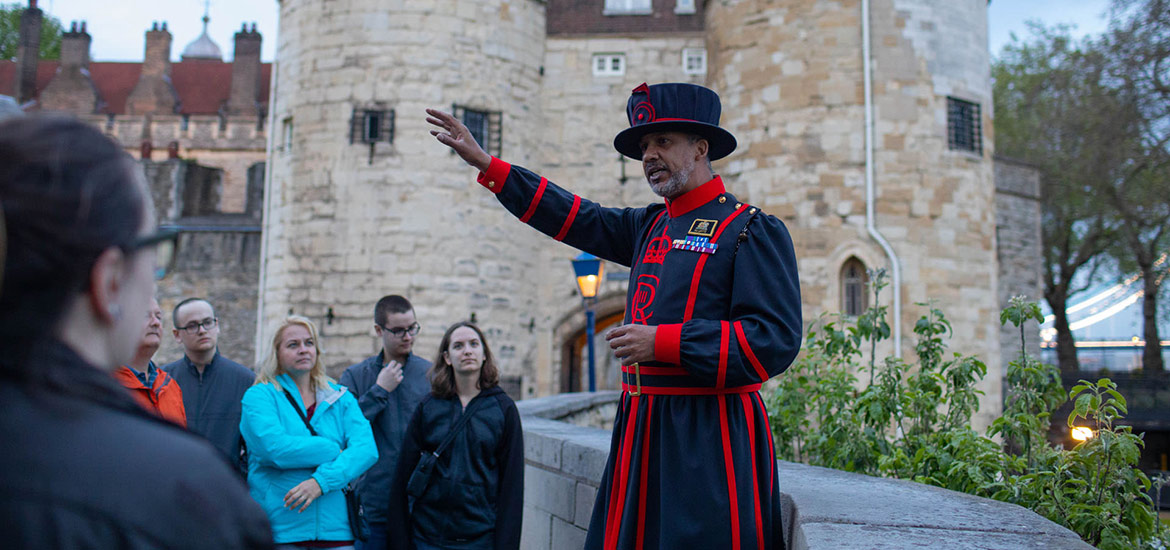 tour guide giving a talk at the london tower