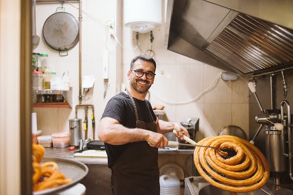 Alfonso making churros at Chocolat cafe in Madrid