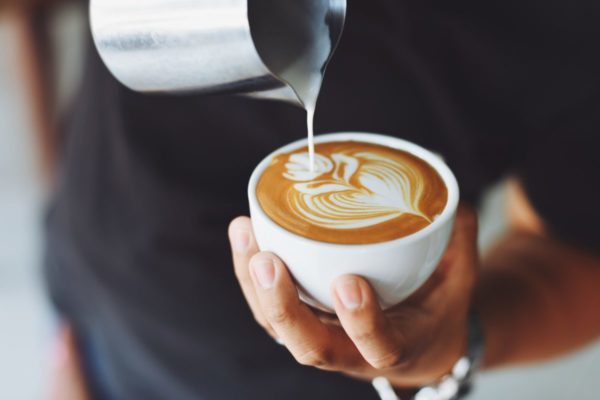 Places like Fábrica Coffee Roasters are serving up the best coffee in Lisbon, complete with latte art.