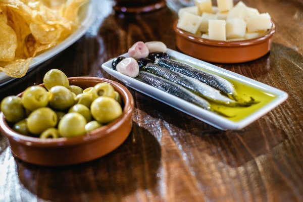 Tapas in Spain are simple, fresh dishes best shared among friends.