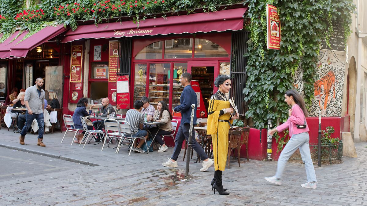 people walking outside of Chez Marianne in Le Marais neighborhood