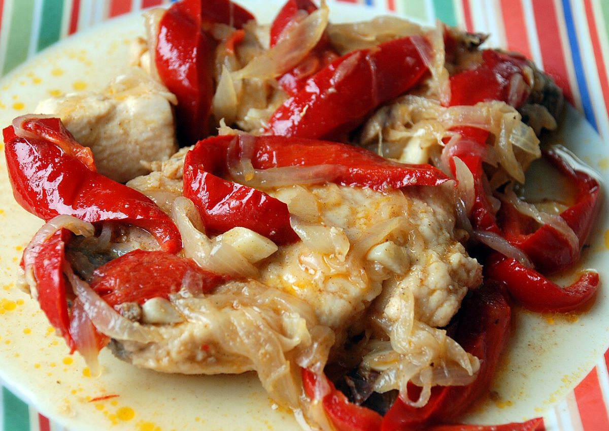 A plate of meat with Spanish piquillo peppers