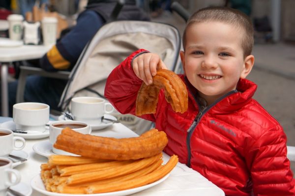 Kids just love churros—especially dipped in chocolate! What's not to love about churros in Barcelona?