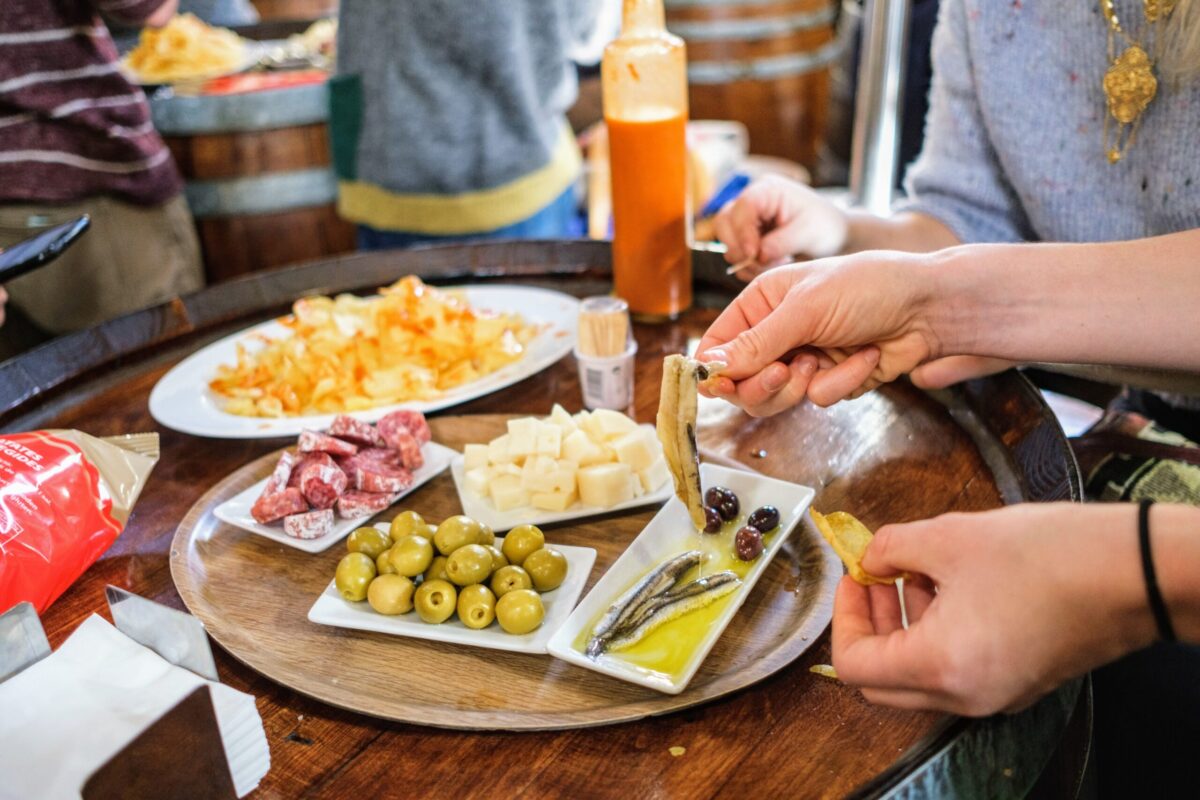 A spread of typical tapas at a bar in Barcelona.