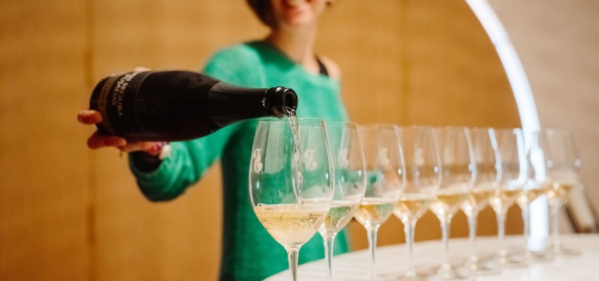 cava being poured into a glass