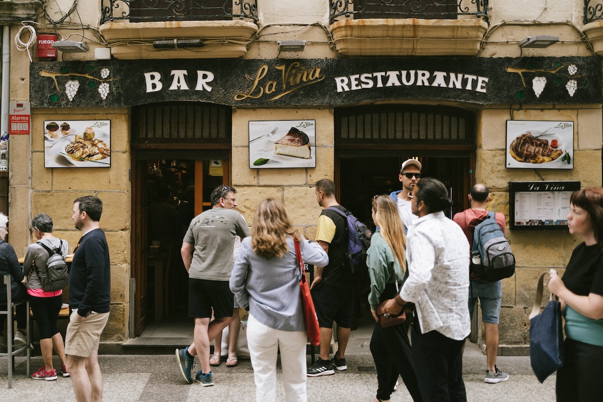 people waiting outside La Viña restaurant