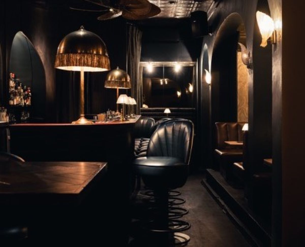 interior of dark bar with leather seats