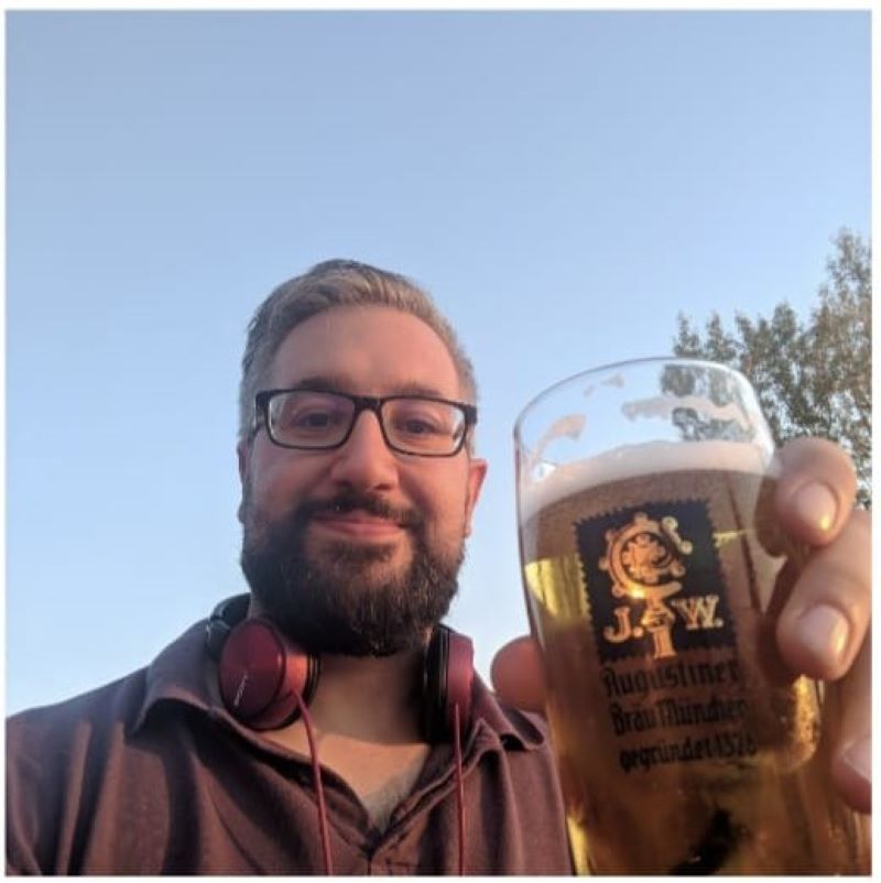 Beer aficionado, Giacomo Rizzi, enjoying a cold craft beer in Amsterdam. 