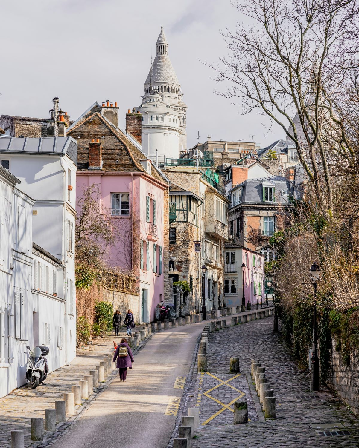 Person walking the streets of Montmartre, Paris.