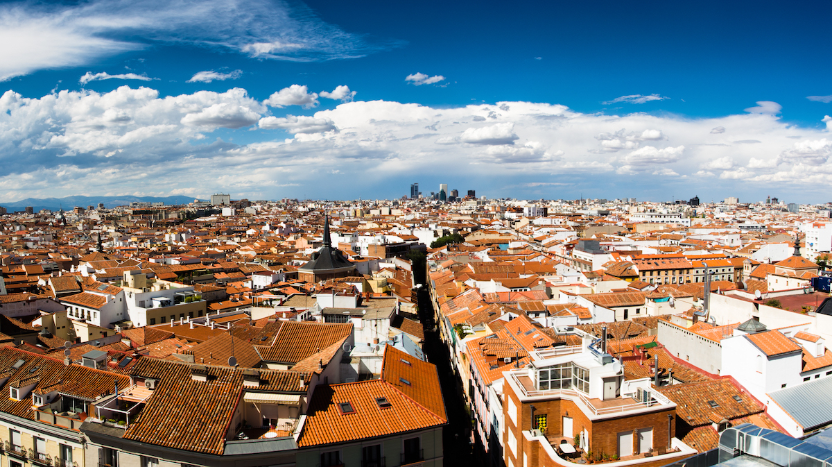 View of Madrid city skyline taken from a rooftop.