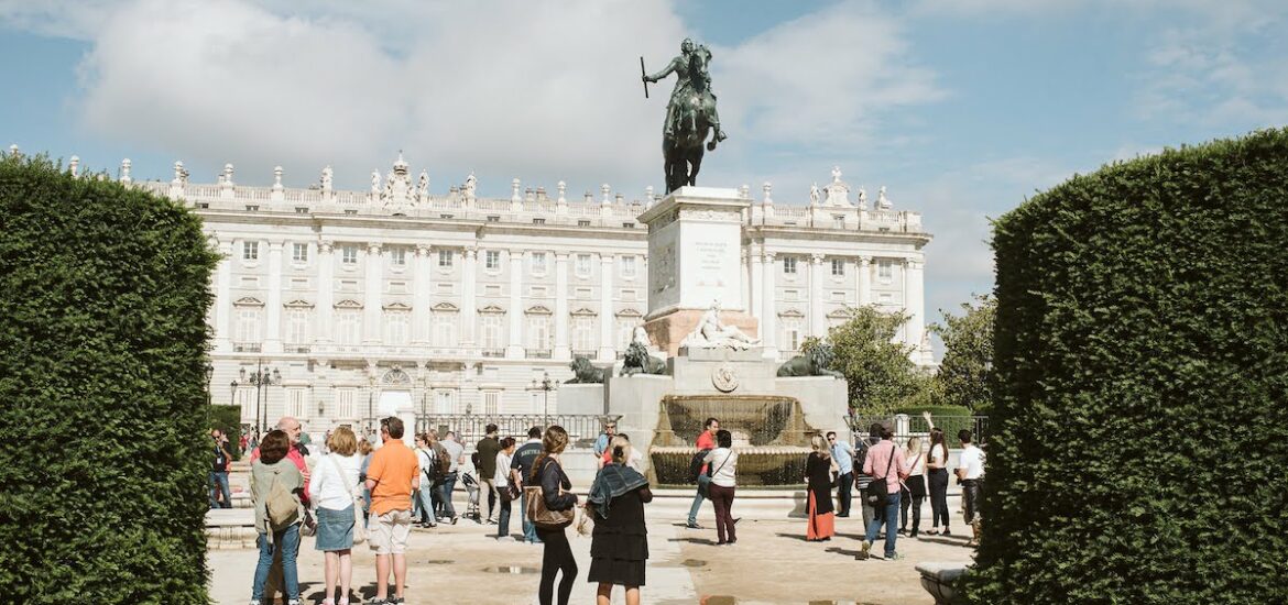 Large statue of a man on horseback in the middle of a public square.