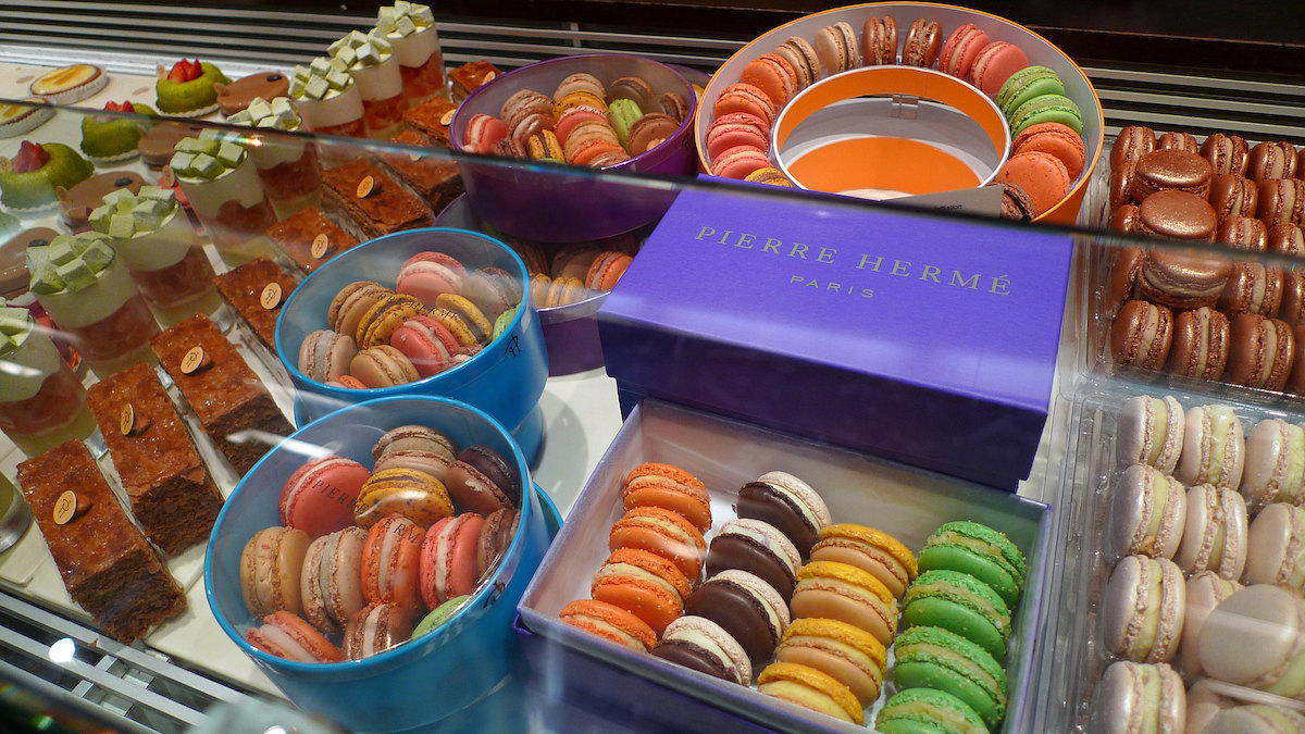 Pierre Hermé Paris with macarons and cakes