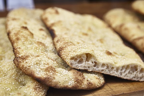 Slices of pizza bianca at the Testaccio Market in Rome