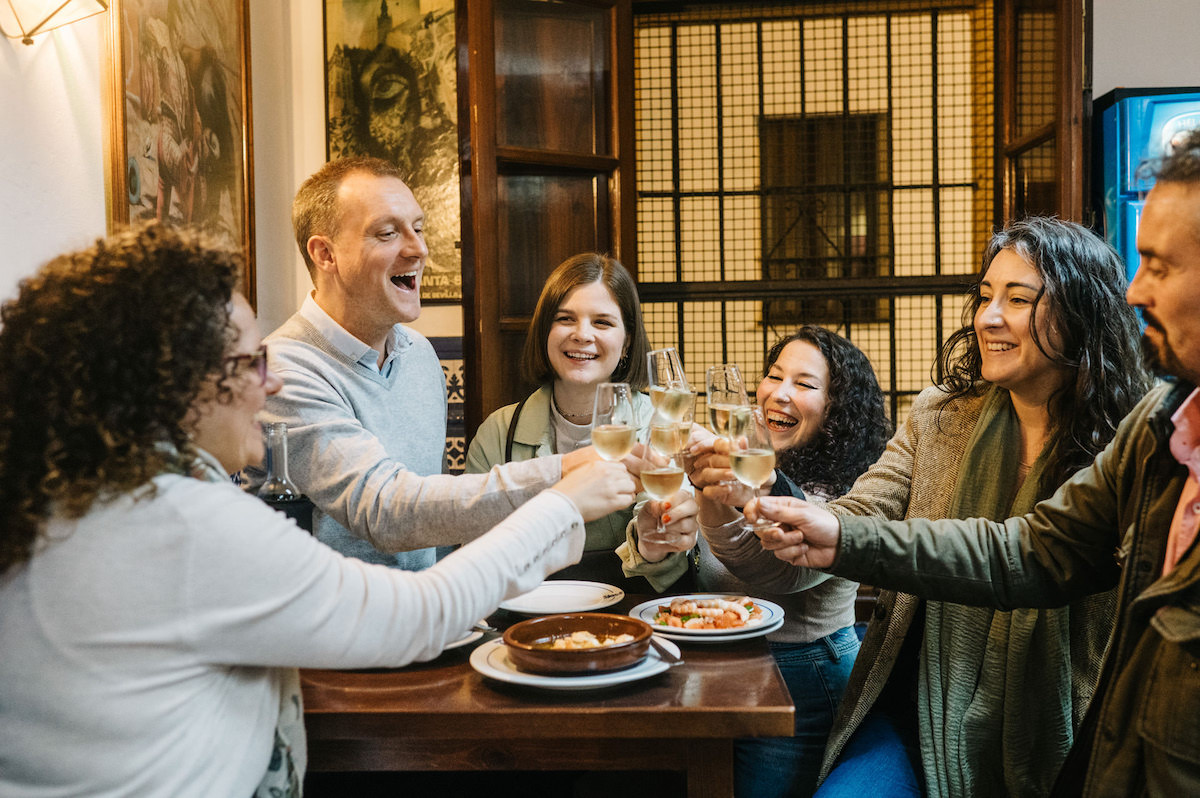 Group drinking sherry wine in Seville