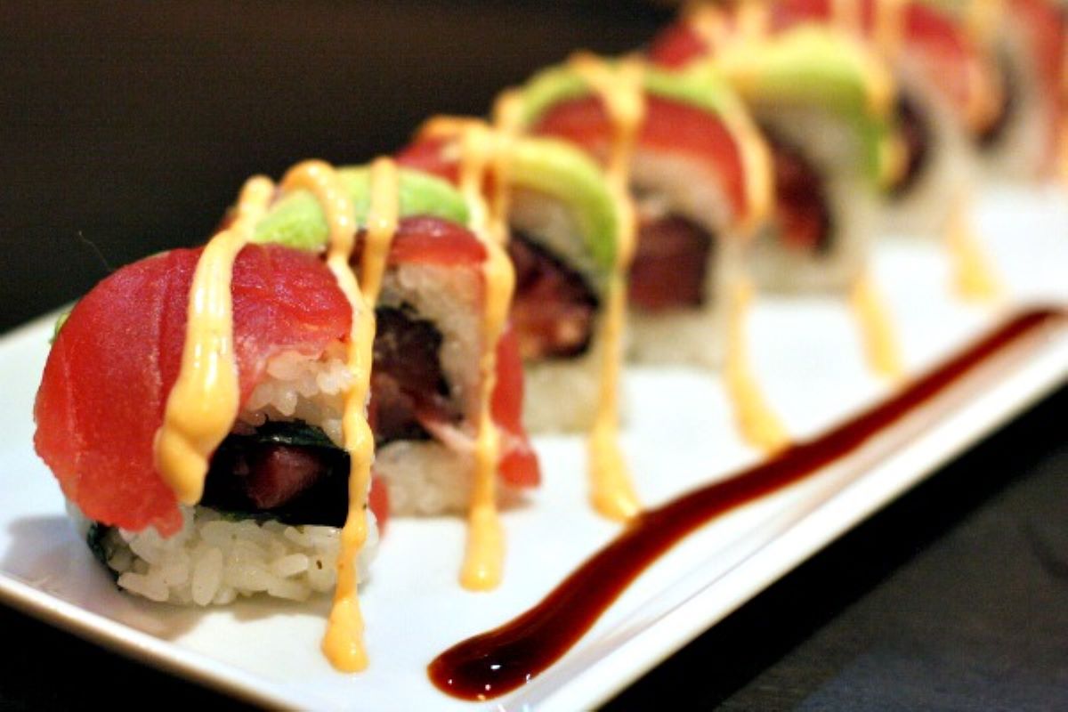 colorful sushi roll on a white plate