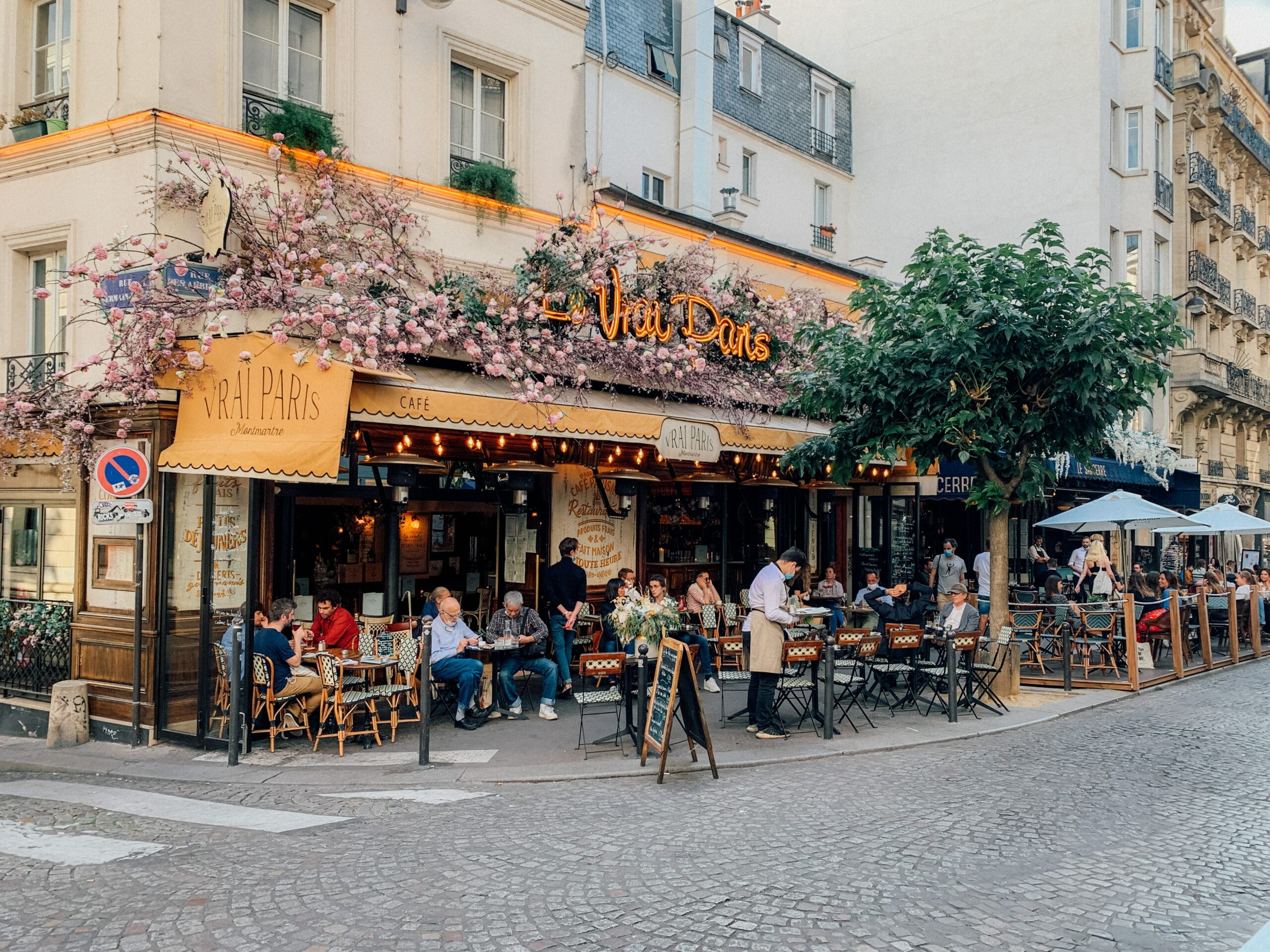 Outside of a floral yellow restaurant front 