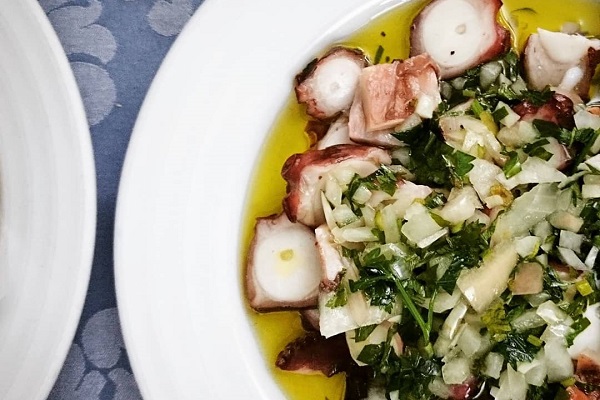 Octopus salad is one of the best petiscos in Lisbon. Drizzled with olive oil and herbs is a great dish to have in the summer!