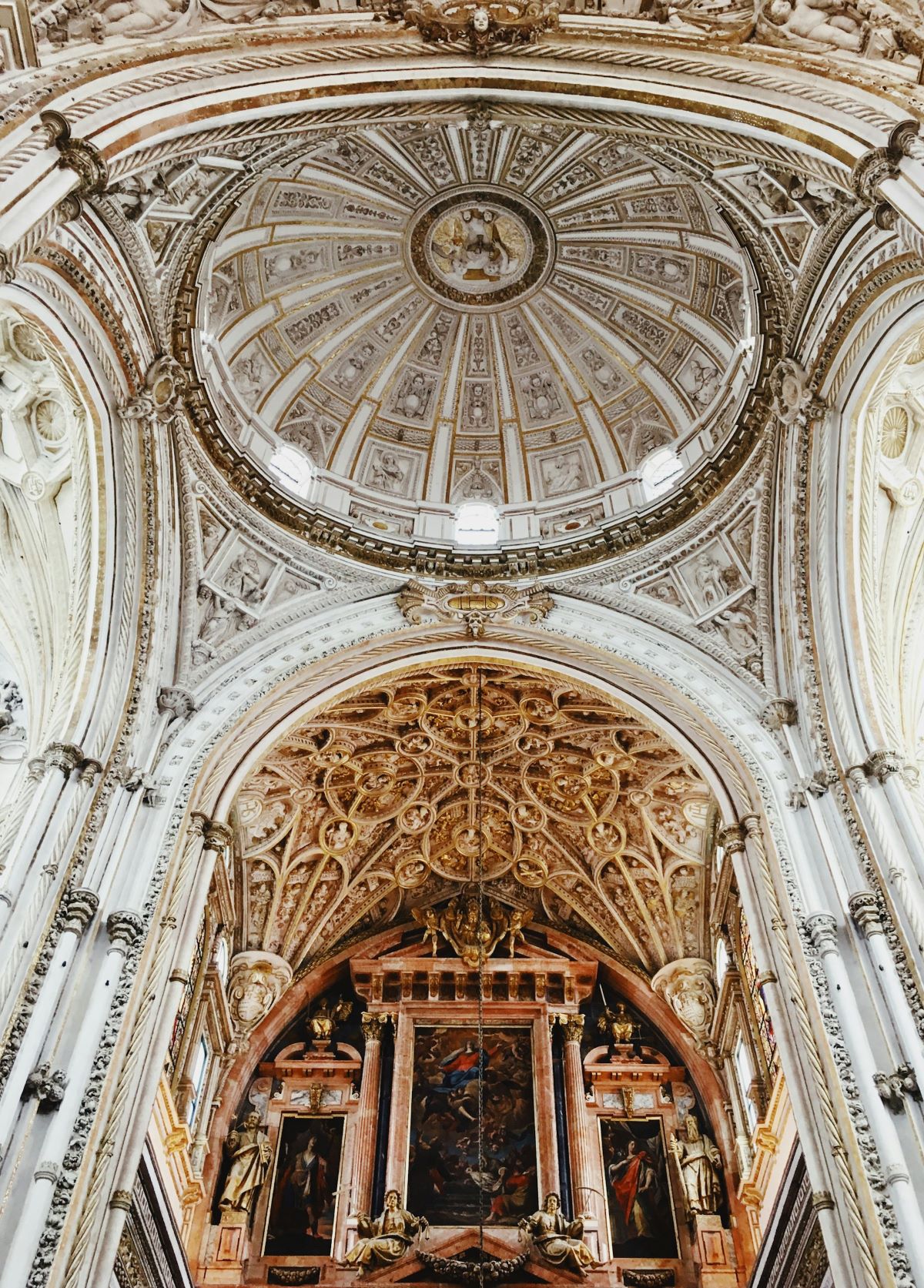ornate ceiling of a church in Seville. 