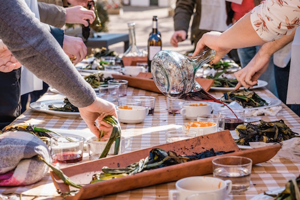 A rustic Catalan feast wouldn't be complete without calçots—one of the main reasons to visit Barcelona in February!