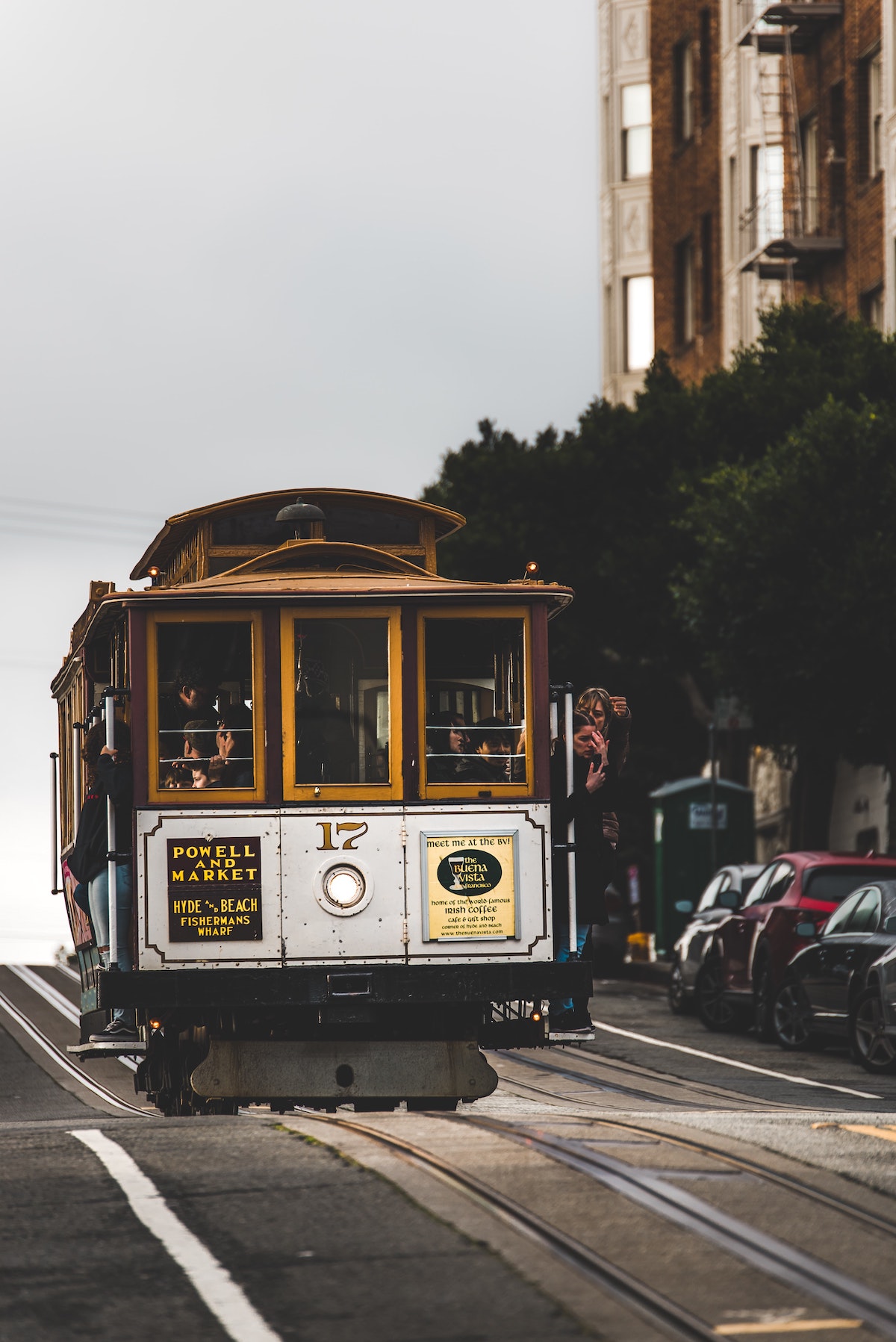 People right an old fashioned cable car in San Francisco