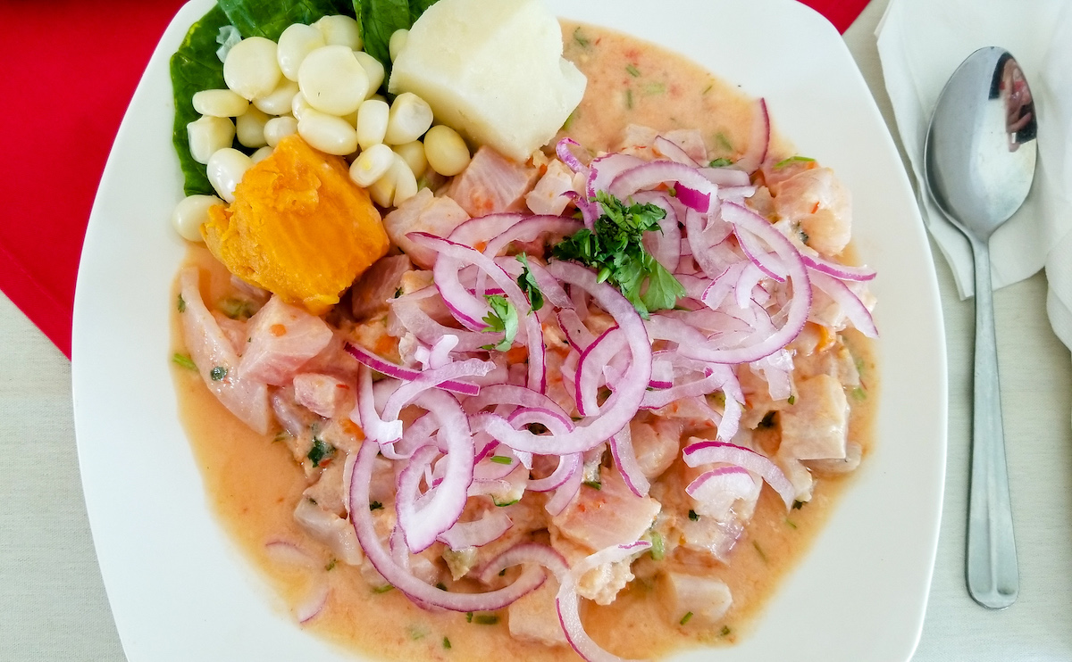 Peruvian ceviche on a white plate.
