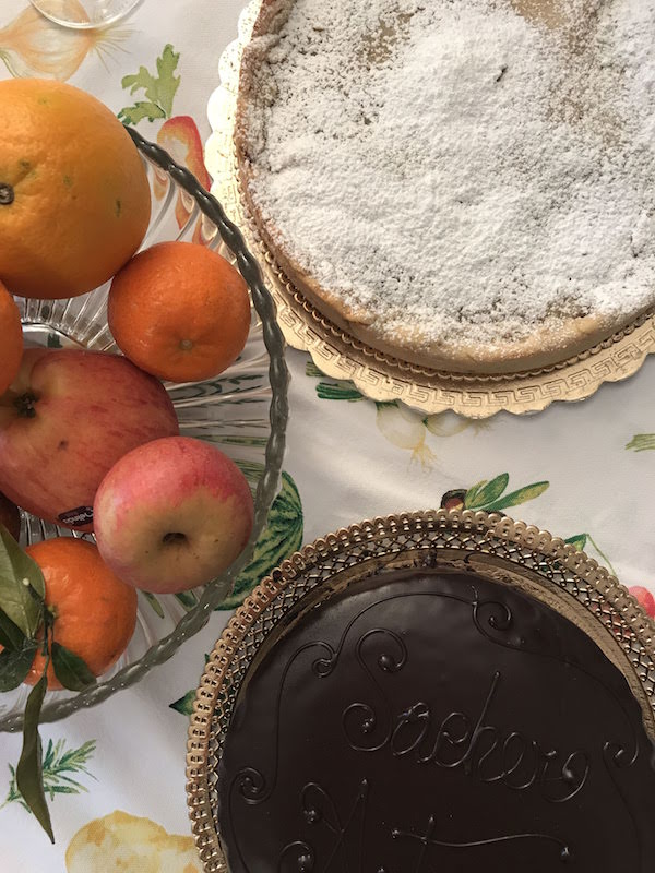 Desserts after a typical Roman meal: two cakes and fresh fruit