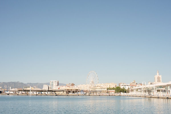 Start off your 24 hours in Malaga with a picture-perfect stroll through Muelle Uno, the city's colorful port area.