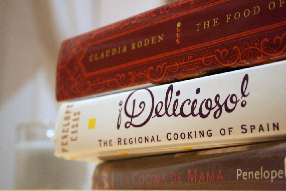 stack of Spanish cookbooks.