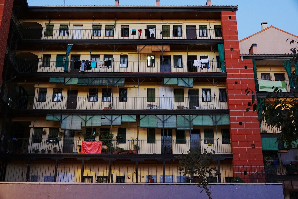 View of apartment block facing an open interior courtyard.