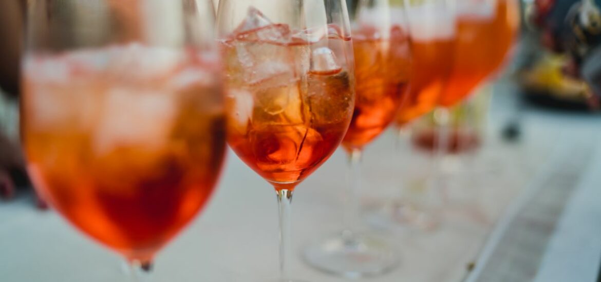 row of glasses of spritz