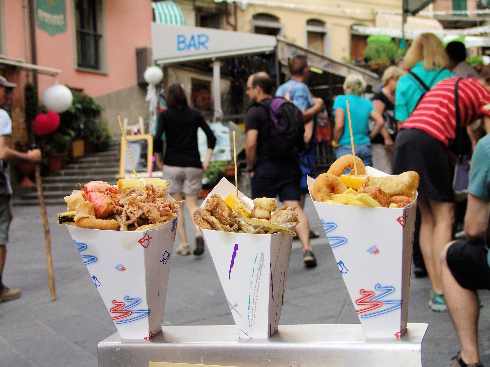 3 cones with fried fish and seafood