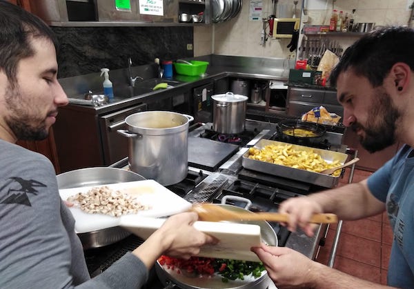 Cooking dinner inside a Basque gastronomic society