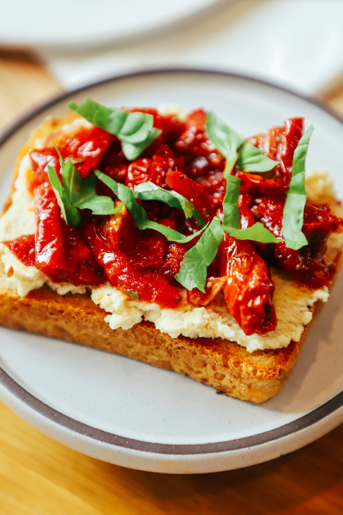 cheese and peppers on top of toast. 