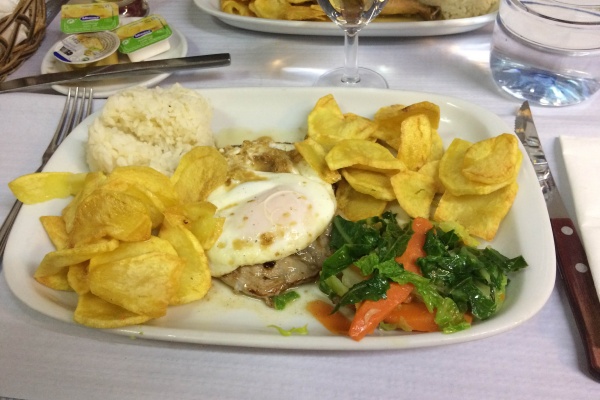 Bitoque at restaurant O Bitoque in Campo de Ourique, one of the most authentic tascas in Lisbon.