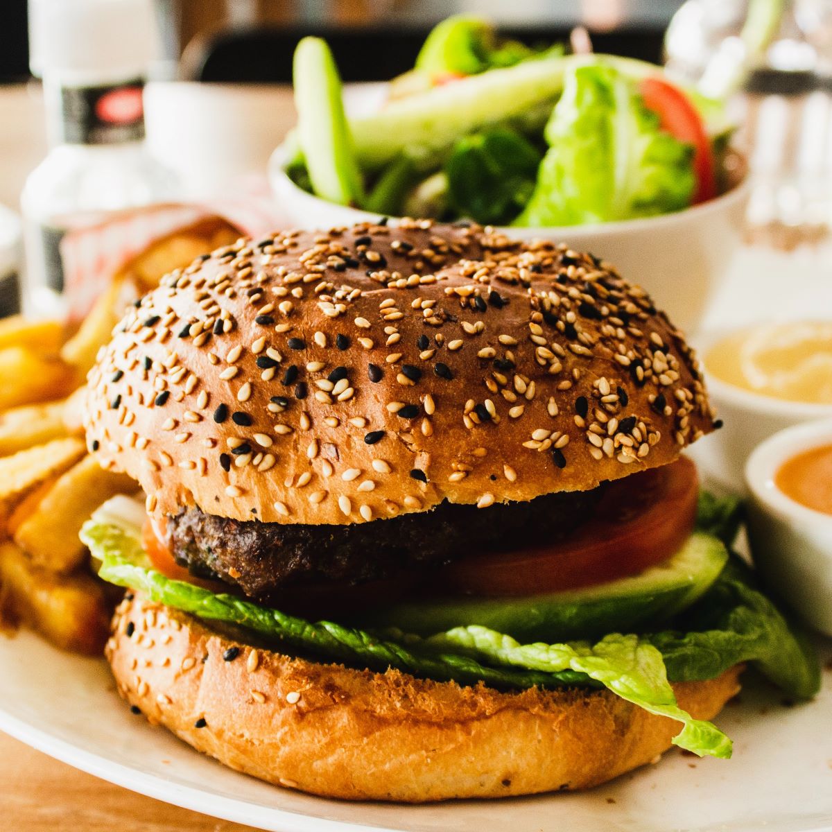 veggie burger with salad and fries