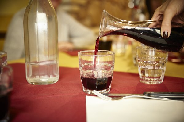 Order a carafe of wine with lunch in Paris.