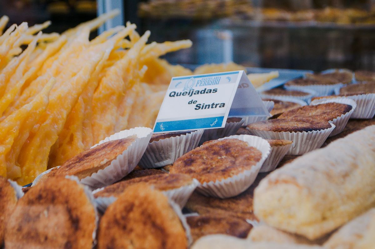 A row of queijadas at a pastry shop in Sintra, Portugal. 