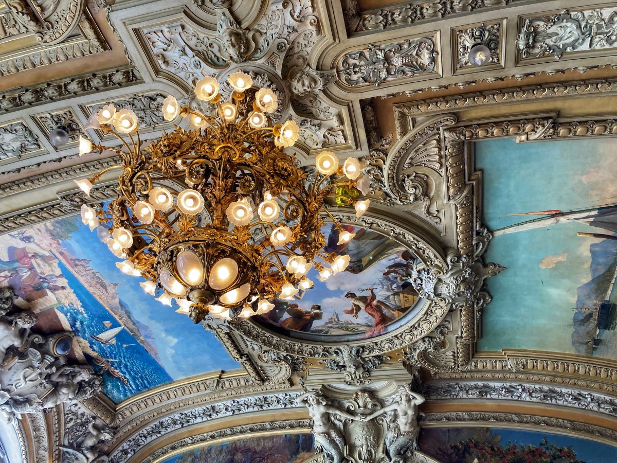 A chandelier hangs from the ceiling at Paris restaurant on Christmas. 