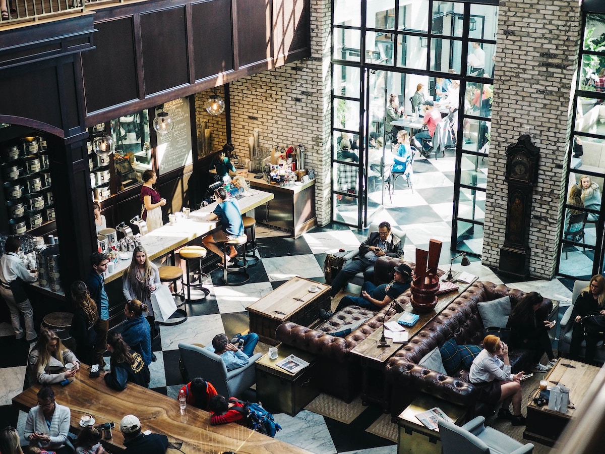 people having coffee at a italian bar